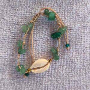Pulsera concha pompon -