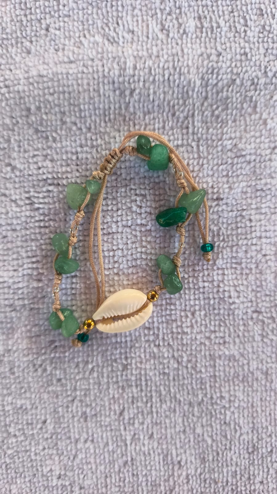 Pulsera concha pompon -